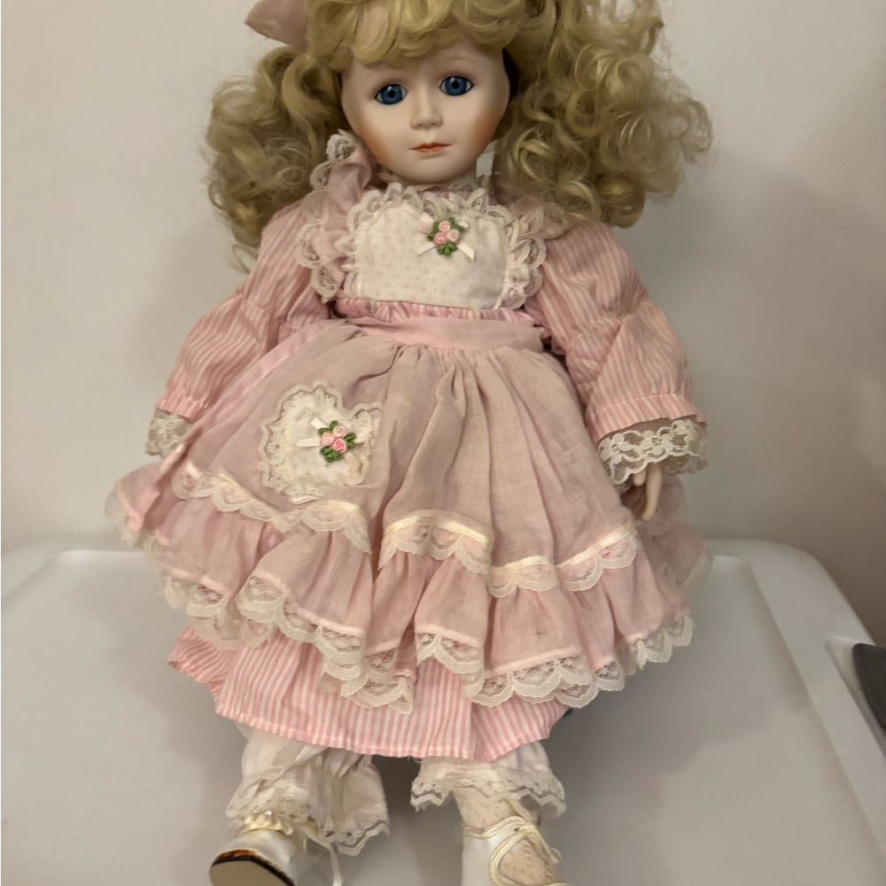 Pink Porcelain Doll with Curly Blonde Hair